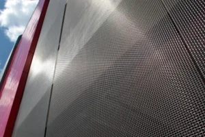 commercial building facade with metal mesh cladding
